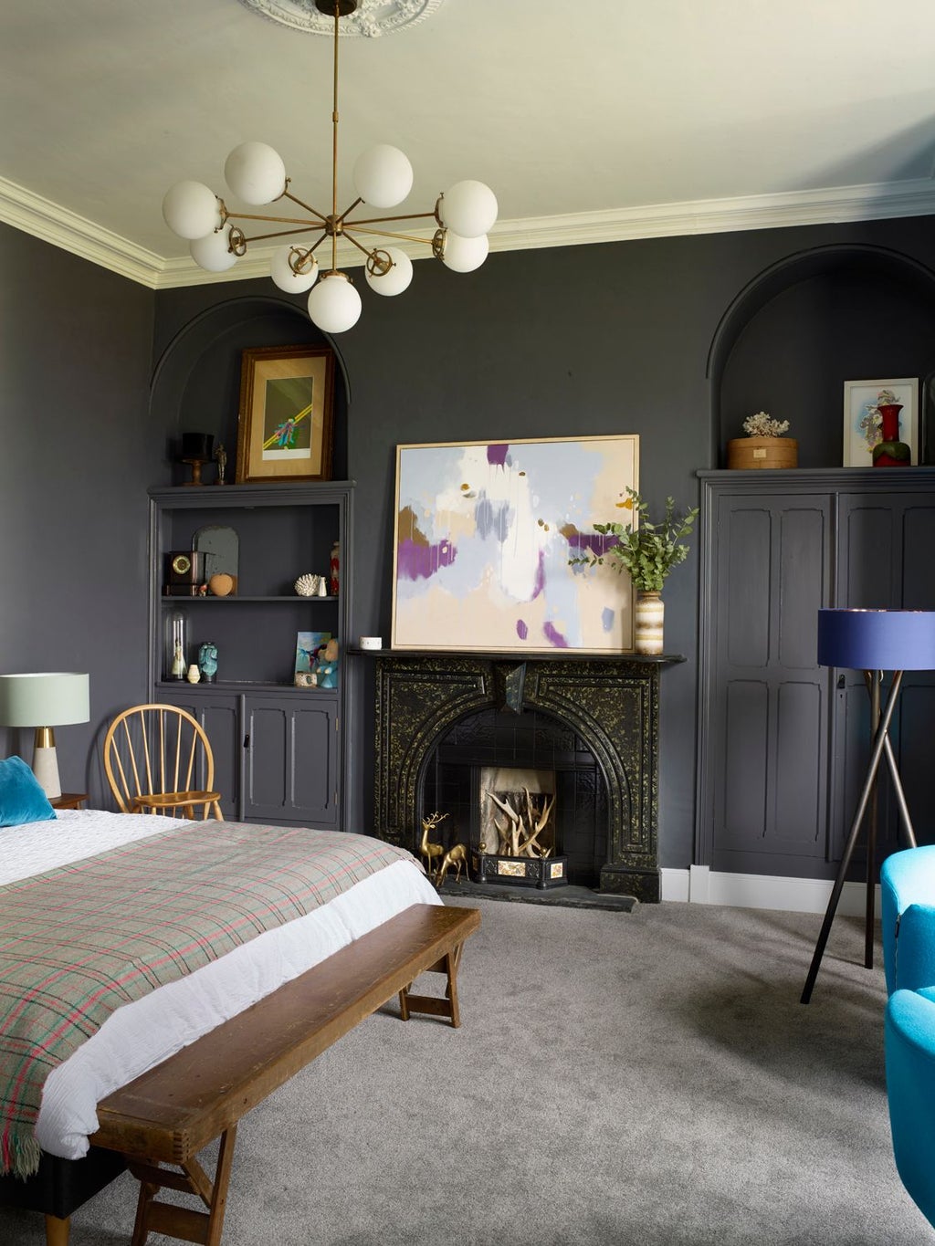 Elegant superior hotel room with plush king bed, sophisticated neutral decor, large windows, and luxurious contemporary furnishings in a UK boutique hotel