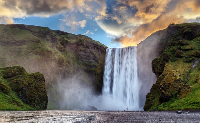 Get up-close and personal and soaking wet as you walk up to the roaring falls of Skógafoss
