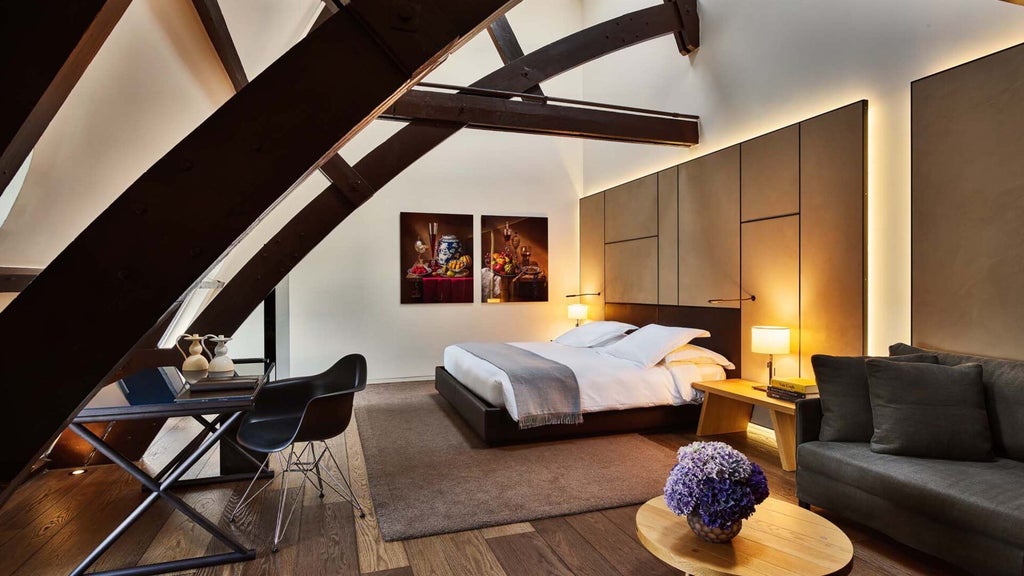 Luxurious rooftop suite with modern Dutch design, panoramic city views, sleek furniture, and elegant minimalist decor in the Conservatorium Hotel, Amsterdam