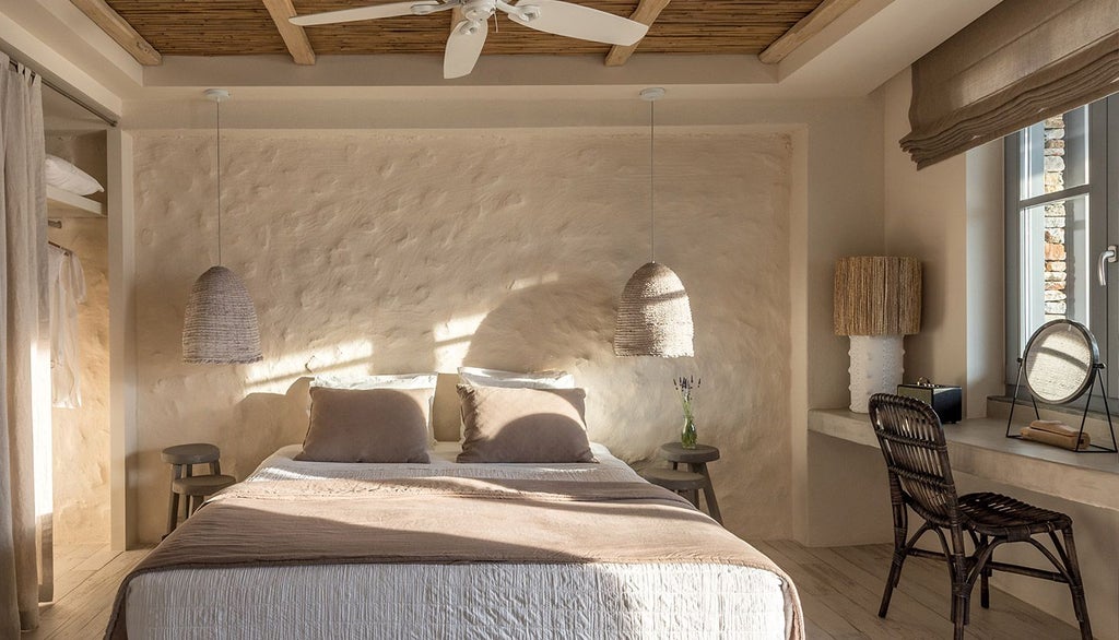 Luxurious white-washed Greek hotel room with minimalist design, panoramic Aegean Sea view, and clean lines highlighting Sifnos island's elegant hospitality aesthetic