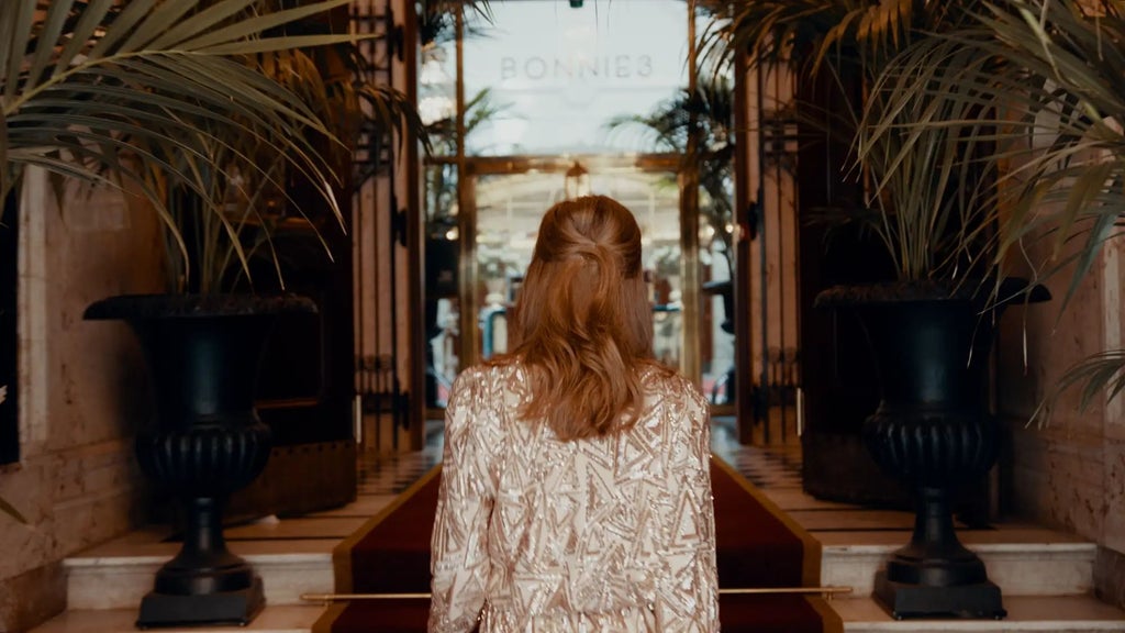 Luxurious neoclassical Bank Hotel lobby in Stockholm, featuring elegant marble columns, crystal chandeliers, and refined Art Nouveau architectural details