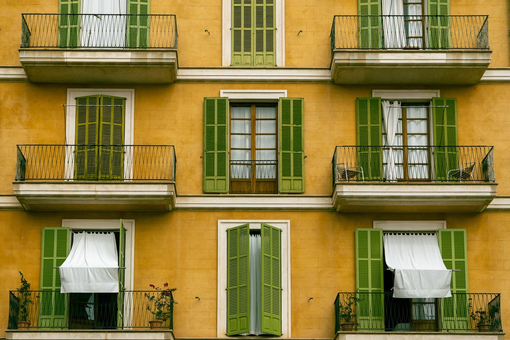 Elegant walking tour through Palma's historic streets, showcasing limestone architecture, vibrant Mediterranean light, and charming cobblestone paths in Spain's Mallorca