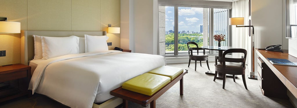 Elegant Club Deluxe King room at Palace Hotel Tokyo, featuring refined Japanese-inspired decor with expansive Inner Moat views and sophisticated contemporary design