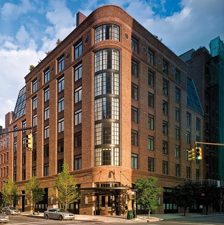 The red brick exterior of the Greenwich Hotel in Manhattan's Tribeca neighborhood