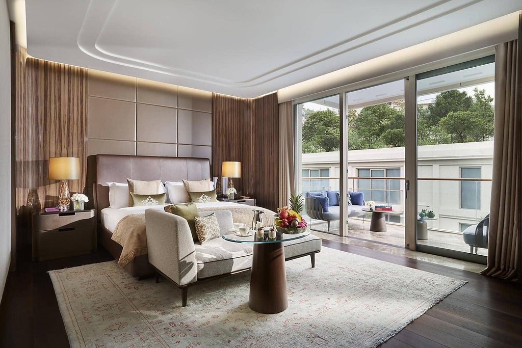 Luxurious Mandarin Bosphorus Suite with panoramic water views, elegant contemporary design, and plush king bed overlooking Istanbul's scenic waterfront.