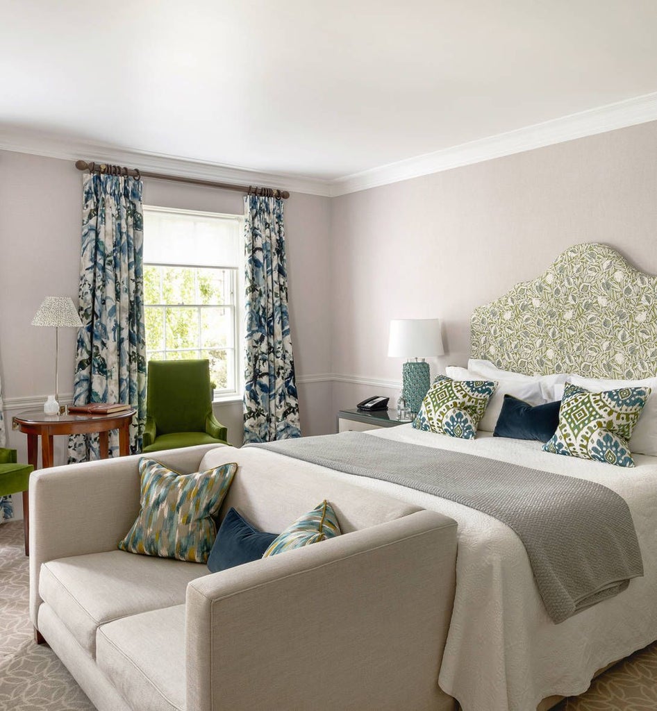 Elegant Georgian-style bedroom with antique furnishings, soft cream palette, and refined period details at a luxurious heritage hotel in Bath, United Kingdom