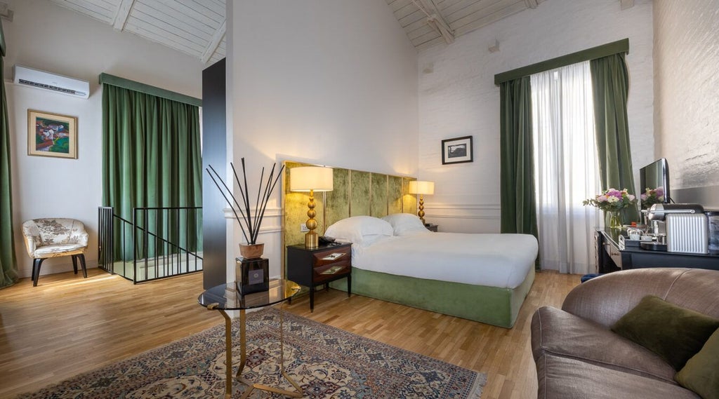 Luxurious Garden Suite at Palazzo Dama with white minimalist decor, elegant four-poster bed, and soft natural light streaming through large windows