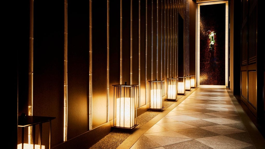 Luxurious hotel lobby of scenset St. Regis Osaka with elegant marble floors, modern chandeliers, and sleek contemporary design in soft neutral tones