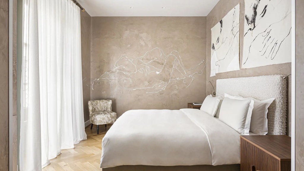 Luxurious contemporary Milan hotel suite with elegant white interior, minimalist design, and artistic furnishings overlooking a charming courtyard