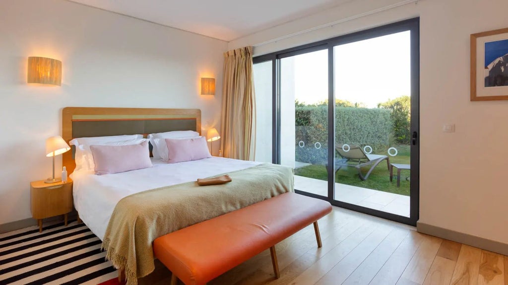 Luxurious Bay House suite at Martinhal Sagres Beach Family Resort, featuring modern design, ocean-view terrace, and contemporary coastal Portugal elegance