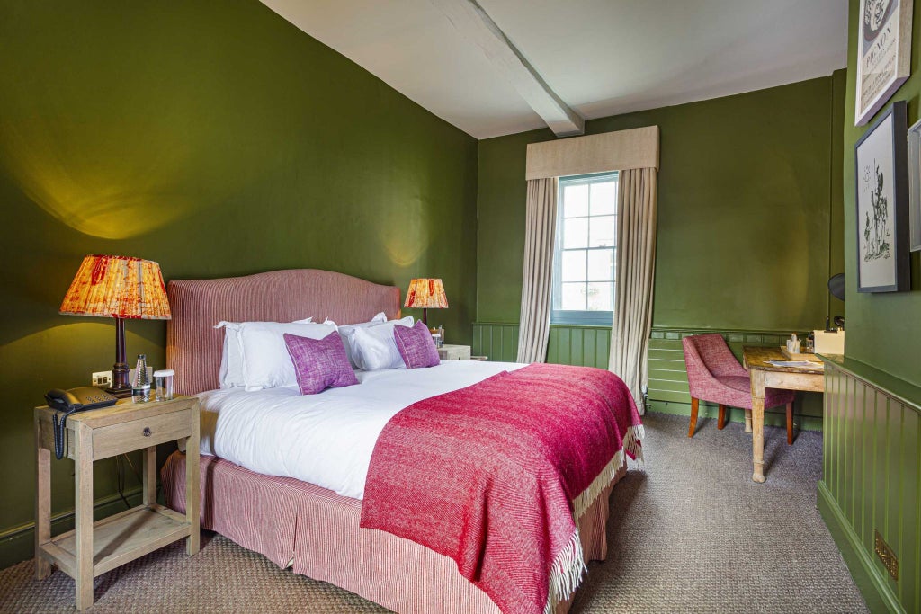 Spacious, elegantly furnished accessible double room with contemporary design, soft neutral tones, and modern amenities at The Talbot Malton in United Kingdom.