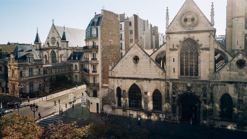 Elegant Parisian hotel facade with stone architecture, ornate balconies, and sophisticated Art Nouveau design, showcasing refined French hospitality