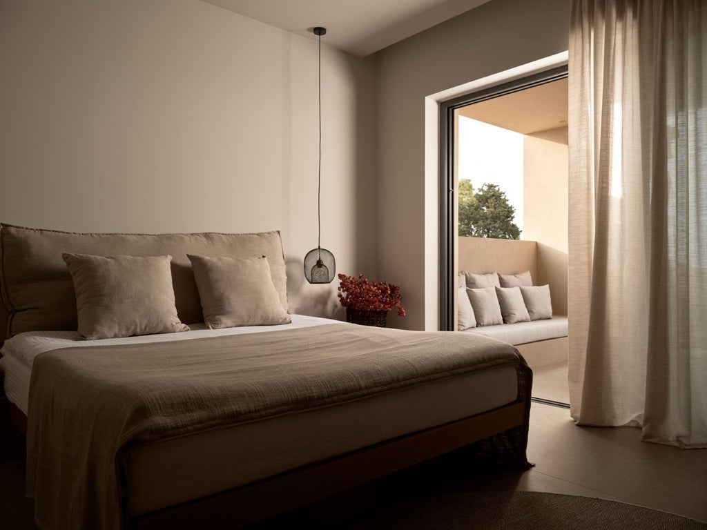 Luxurious white villa bedroom with panoramic sea view, elegant four-poster bed, and minimalist Greek island decor in soft neutral tones