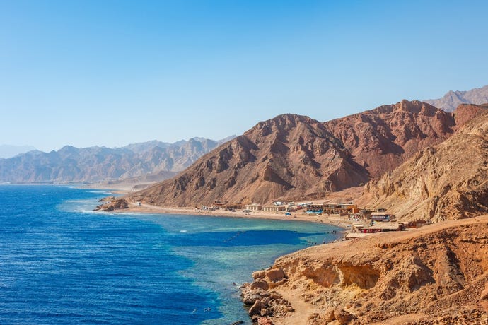 The rugged coastline and part of the blue hole