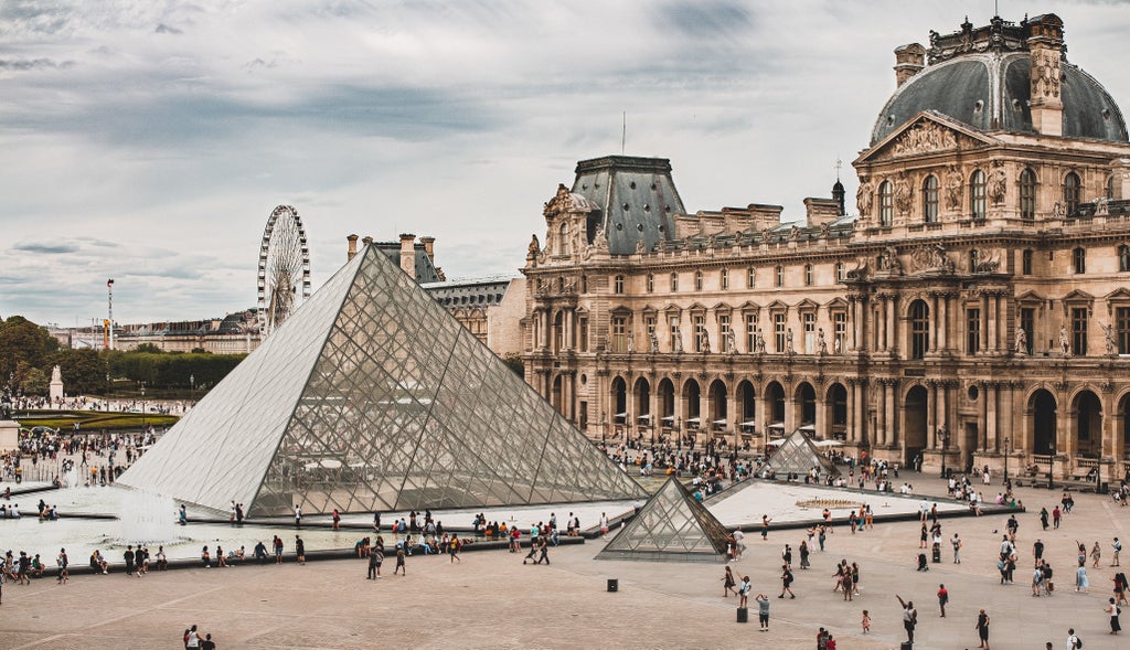 Private tour guide gestures towards Mona Lisa painting in elegant Louvre gallery, marble columns and ornate frames in warm lighting