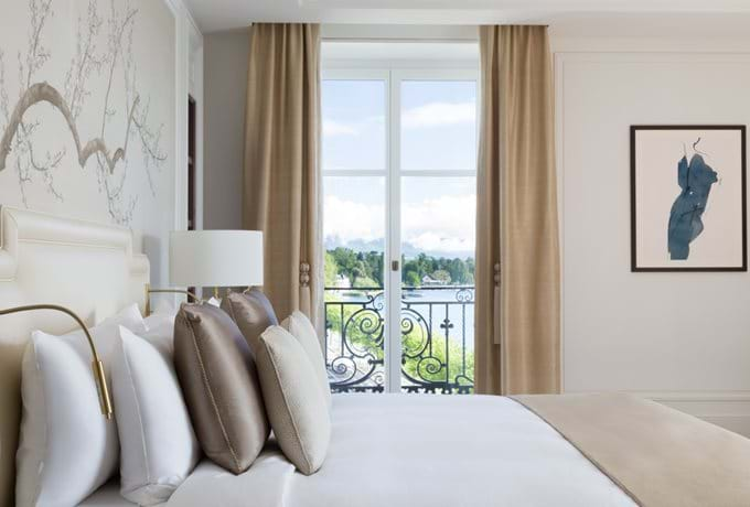 Elegant five-star lakeside hotel in Geneva featuring Belle Époque architecture, private balconies and panoramic Lake Geneva views