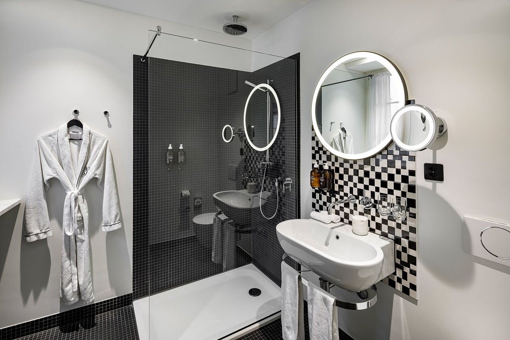 Elegant large double room at Scenset Marktgasse Hotel with plush white bedding, contemporary Swiss design, and warm wooden accents