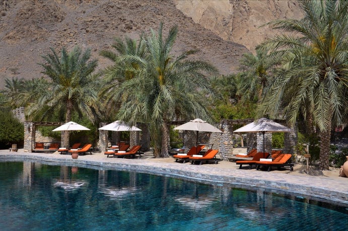 The main pool is surrounded by palm trees, the resort has over 1,000 in total